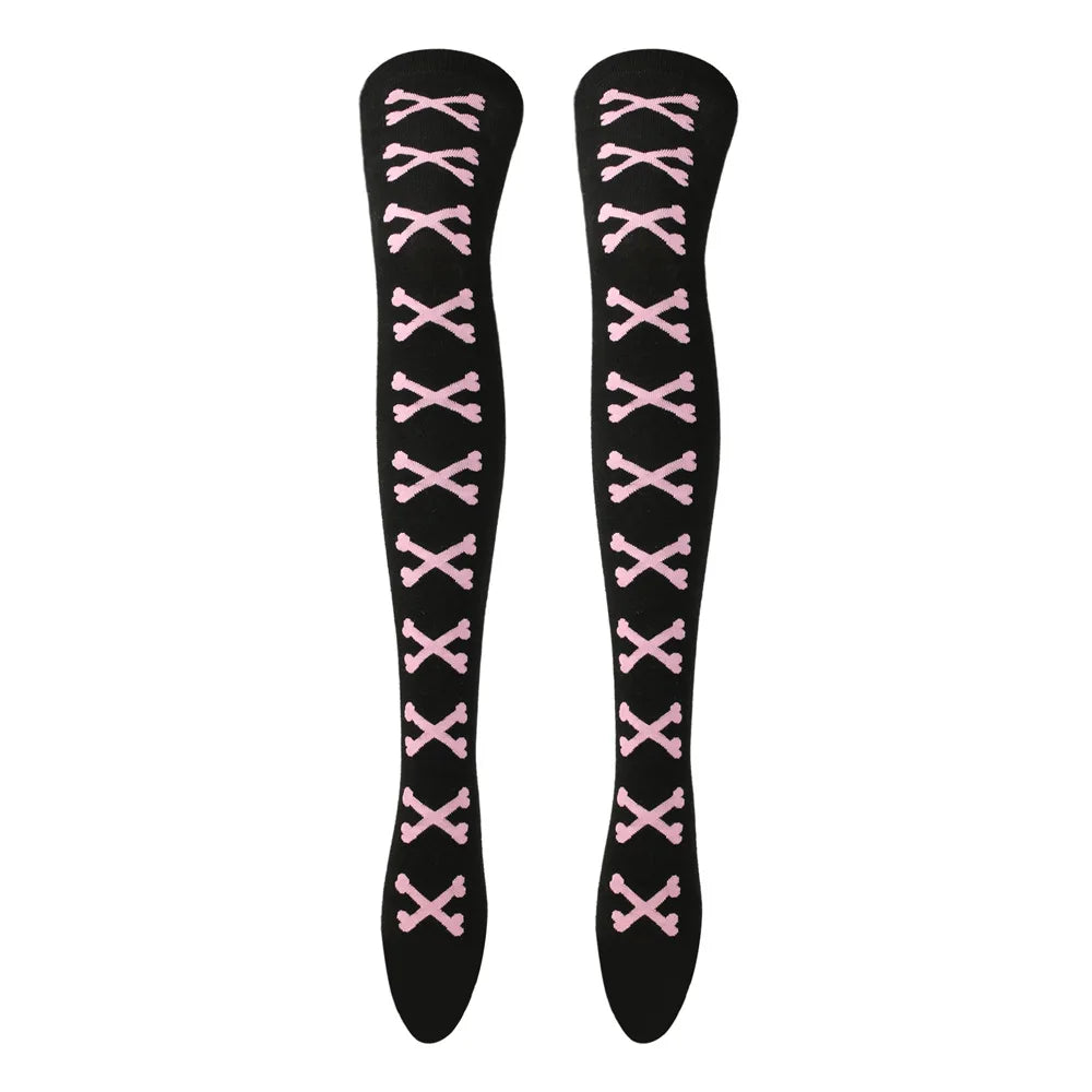 Black and light pink crossed bones stockings, soft, playful, and kawaii DDLG/ABDL friendly.