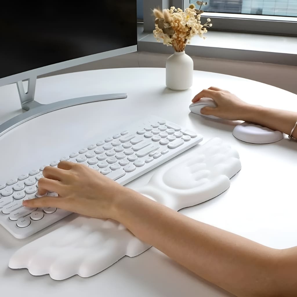 Pastel kawaii wrist rest with memory foam support and angel wing design, ideal for littles, gamers, and students.