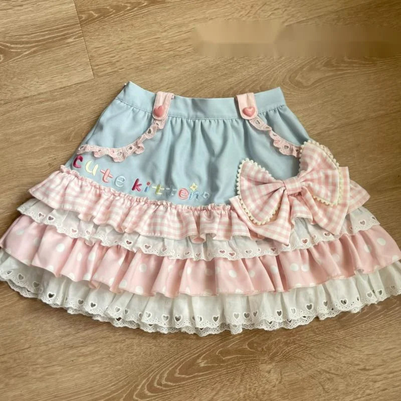 Cute Lolita coord with kitten, bow, and heart details in pastel tones