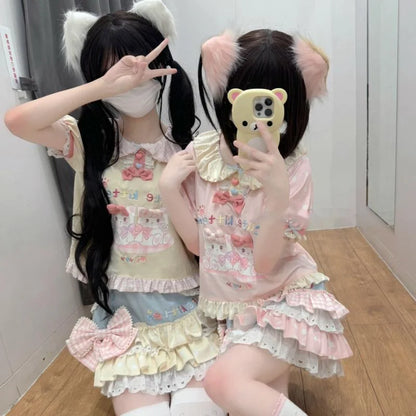 Cute kitten graphic tee with pastel skirt for a dreamy kawaii look