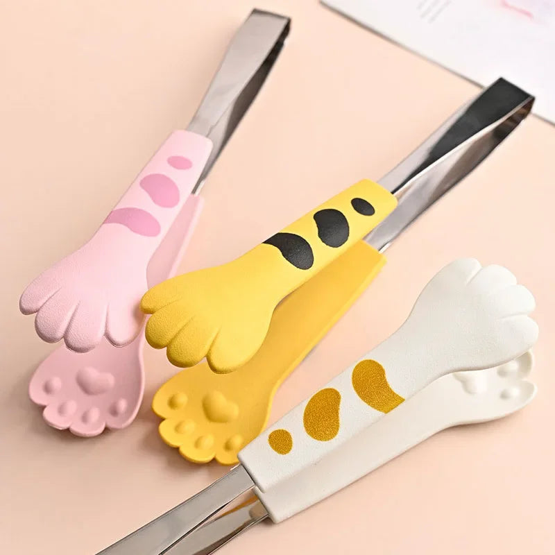 Cute silicone cat paw tongs with stainless steel handle for kitchen baking and snack prep