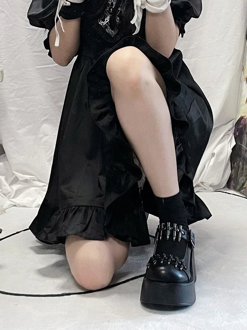 Chunky platform shoes featuring bullet-style straps, perfect for goth, cutecore, and rebellious looks