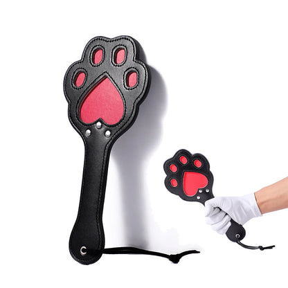 Adorable paw-shaped spanking paddle for playful DDLG moments and flirty fun