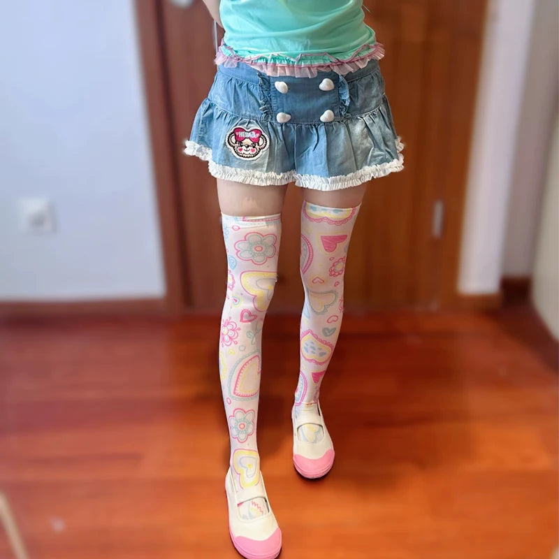 Cutecore tricolor candy heart stockings featuring pastel hearts, flowers, and playful soft vibes