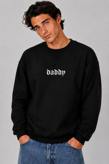 Man wearing white Daddy Energy sweater in a casual cozy lifestyle shot
