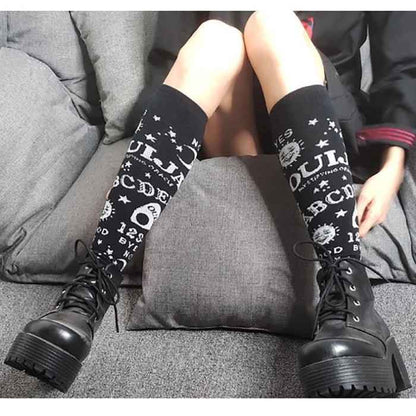 Dark Ouija stockings in black and white with yin-yang symbols and mystical kawaii cutecore vibes