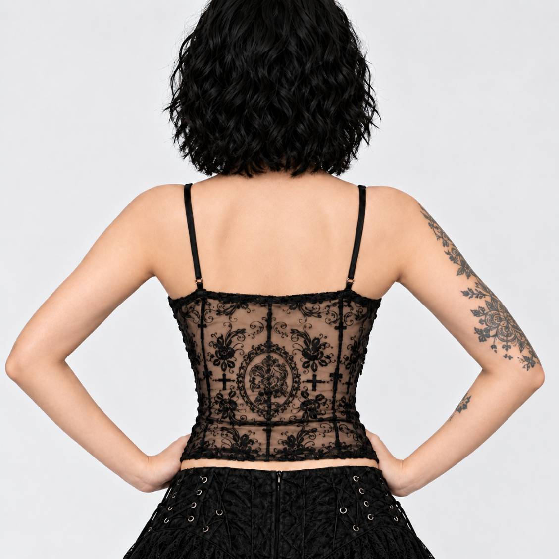 Model wearing Dark Rose gothic cami top, back view, dark academia style