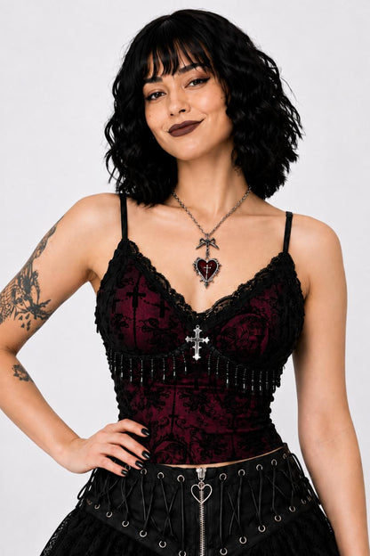 Model posing in Dark Rose gothic cami top, showing off cross pendant detail