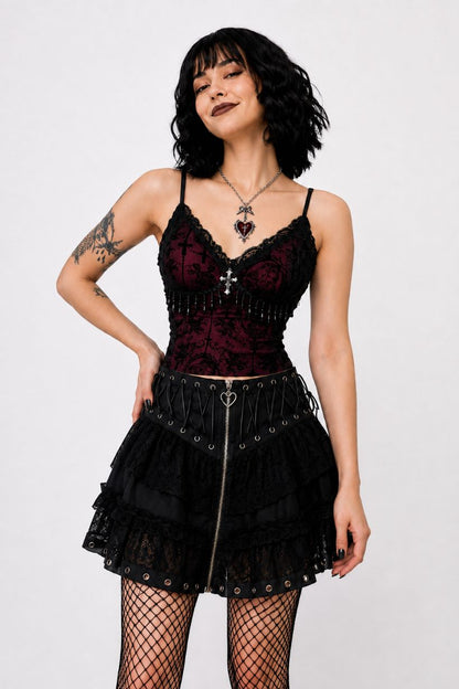 Model posing in Dark Rose gothic cami top, dark romance alternative style