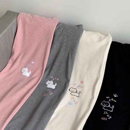 Set of kawaii wide leg sweatpants in pink, gray, apricot, and black with playful cat drawing for DDLG ABDL