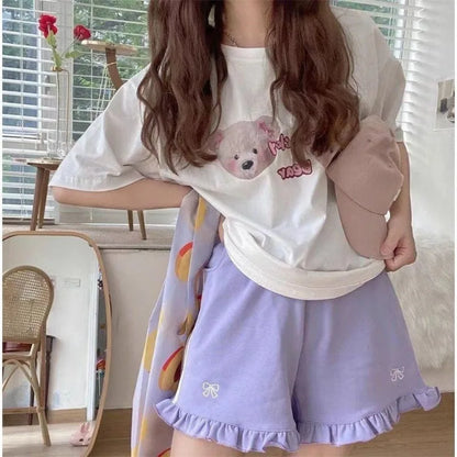 Kawaii purple lounge shorts with ribbon embroidery, side stripes, and ruffle trim for soft girl ABDL outfits