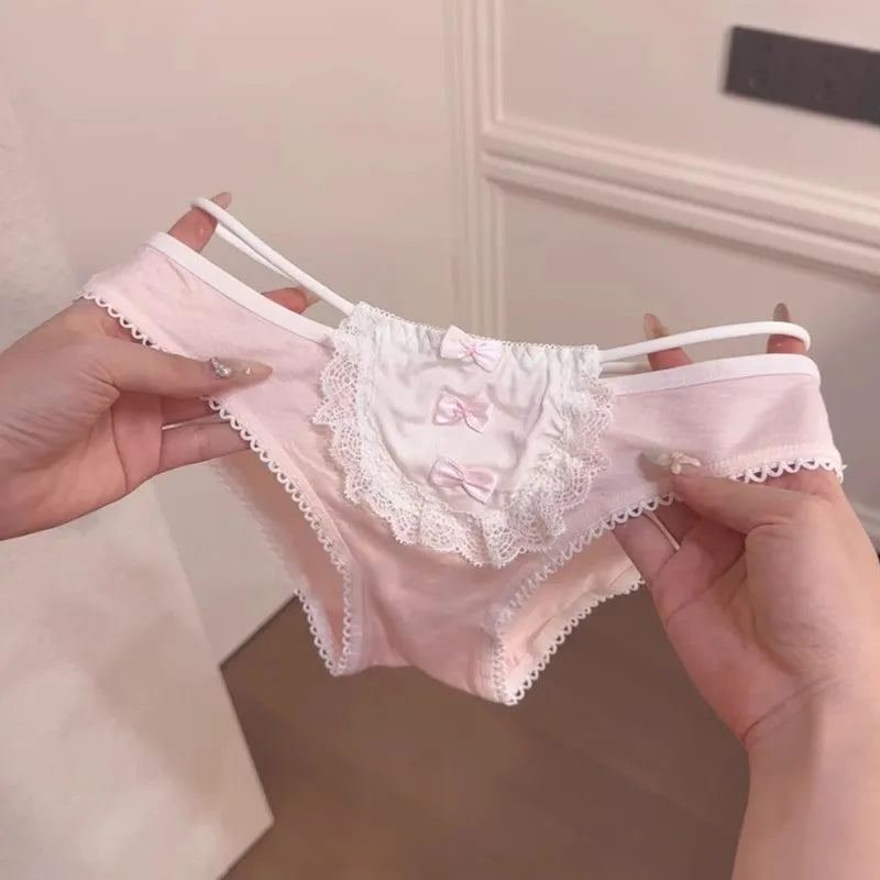 Pastel pink lolita panties with front bows, lace sides, and flirty back hollow for kawaii DDLG ABDL outfits