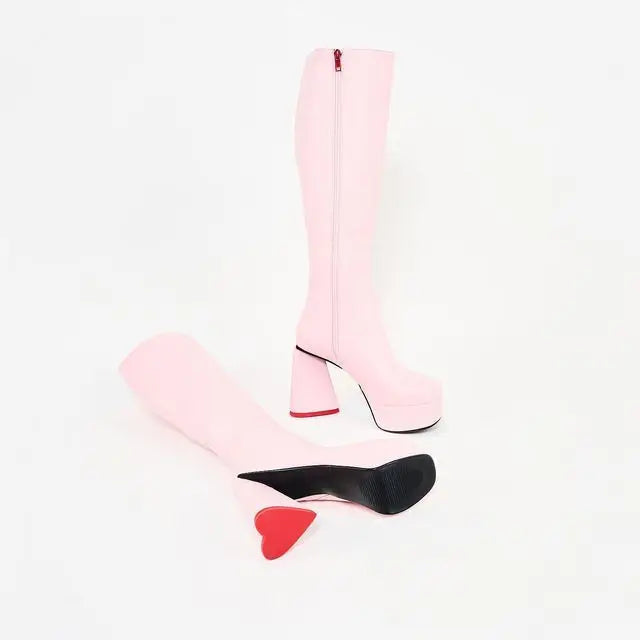 DDLG Heartquake heels with red accents, chunky platforms, and heart-shaped heel