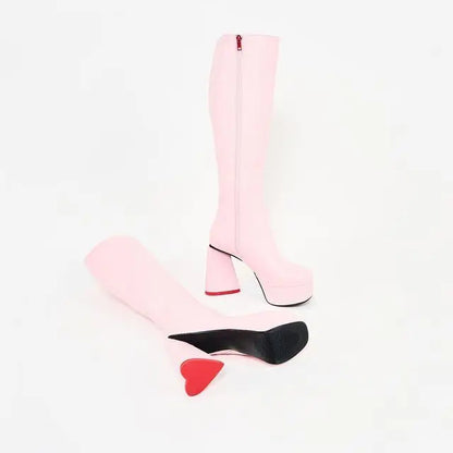 DDLG Heartquake heels with red accents, chunky platforms, and heart-shaped heel