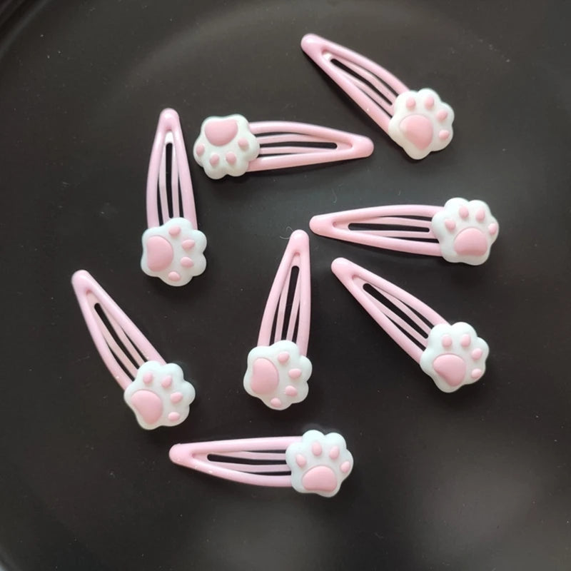 Soft pink paw hair clips with strong grip, ideal for DDLG and kawaii everyday wear