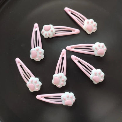 Soft pink paw hair clips with strong grip, ideal for DDLG and kawaii everyday wear