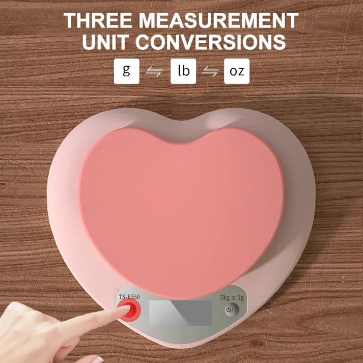 Compact pink food scale with clear dial and multiple units for accurate kitchen measurements