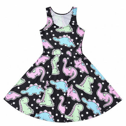 Model close up showing pastel dino print detail on polka dot dress