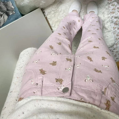 Pink denim pants with tapered dolly legs and plush bear print, ideal for ABDL and kawaii dollcore looks