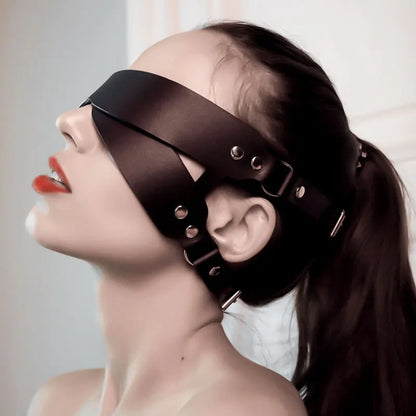 Side view of blindfold, showing snug fit and edgy fetish design