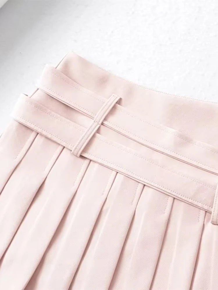 Sharp knife pleat detail on double heart buckle mini skirt, DDLGirl style
