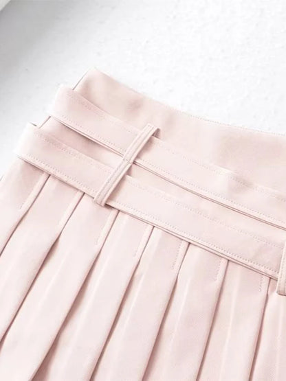 Sharp knife pleat detail on double heart buckle mini skirt, DDLGirl style