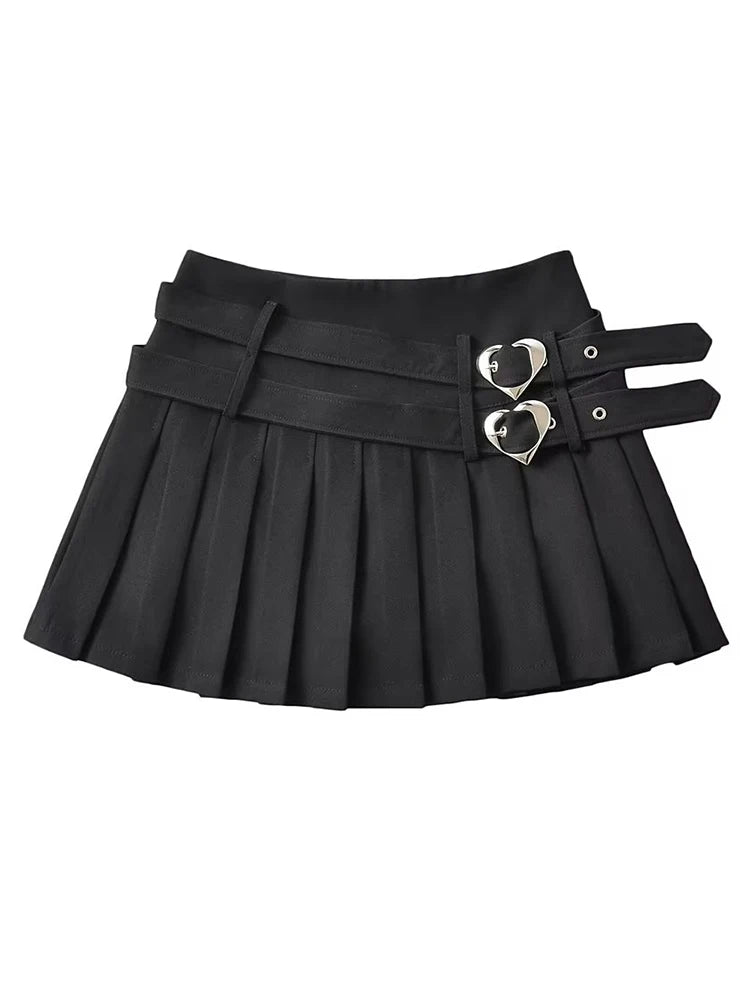 Model wearing double heart buckle pleated mini skirt, DDLGirl Y2K brat style