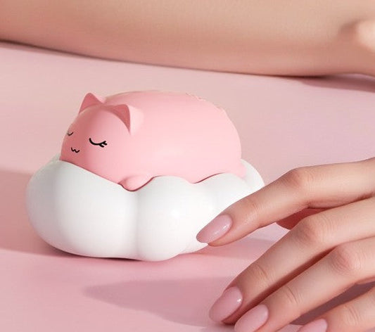 Dream Puff Kitty Buzz Toy in pastel colors, compact and playful, perfect for cutecore vibes
