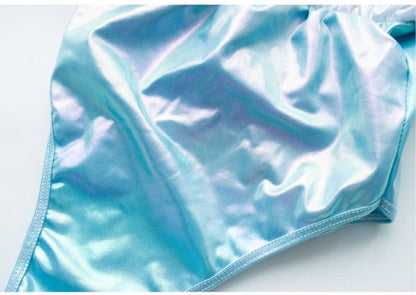 Flirty cutecore holographic blue ruffle bodysuit, soft girl fashion for ddlgirls and pastel aesthetics