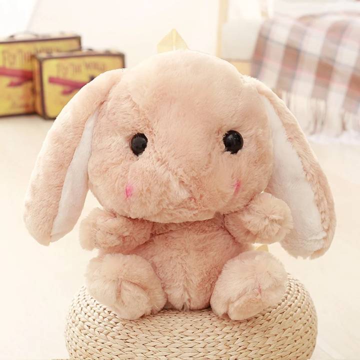 Cream floppy bunny kawaii doll backpack with soft plush exterior, dollcore accessory