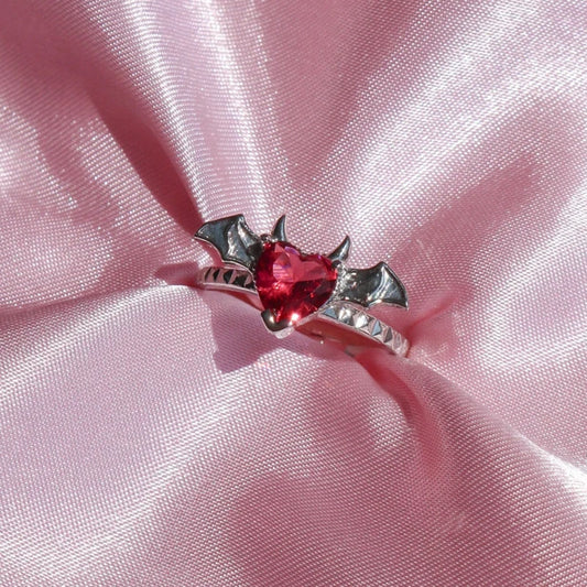 black forbidden love heart ring with sculpted wings and horns edgy gothic jewelry