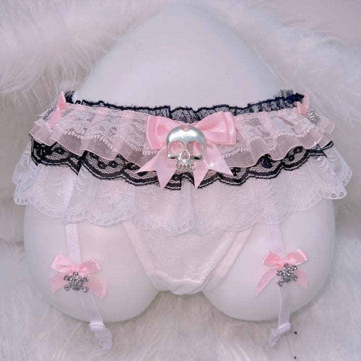 Gothic-inspired thong and garter set with creepy-cute skulls, perfect for alt, Harajuku, or Y2K outfits