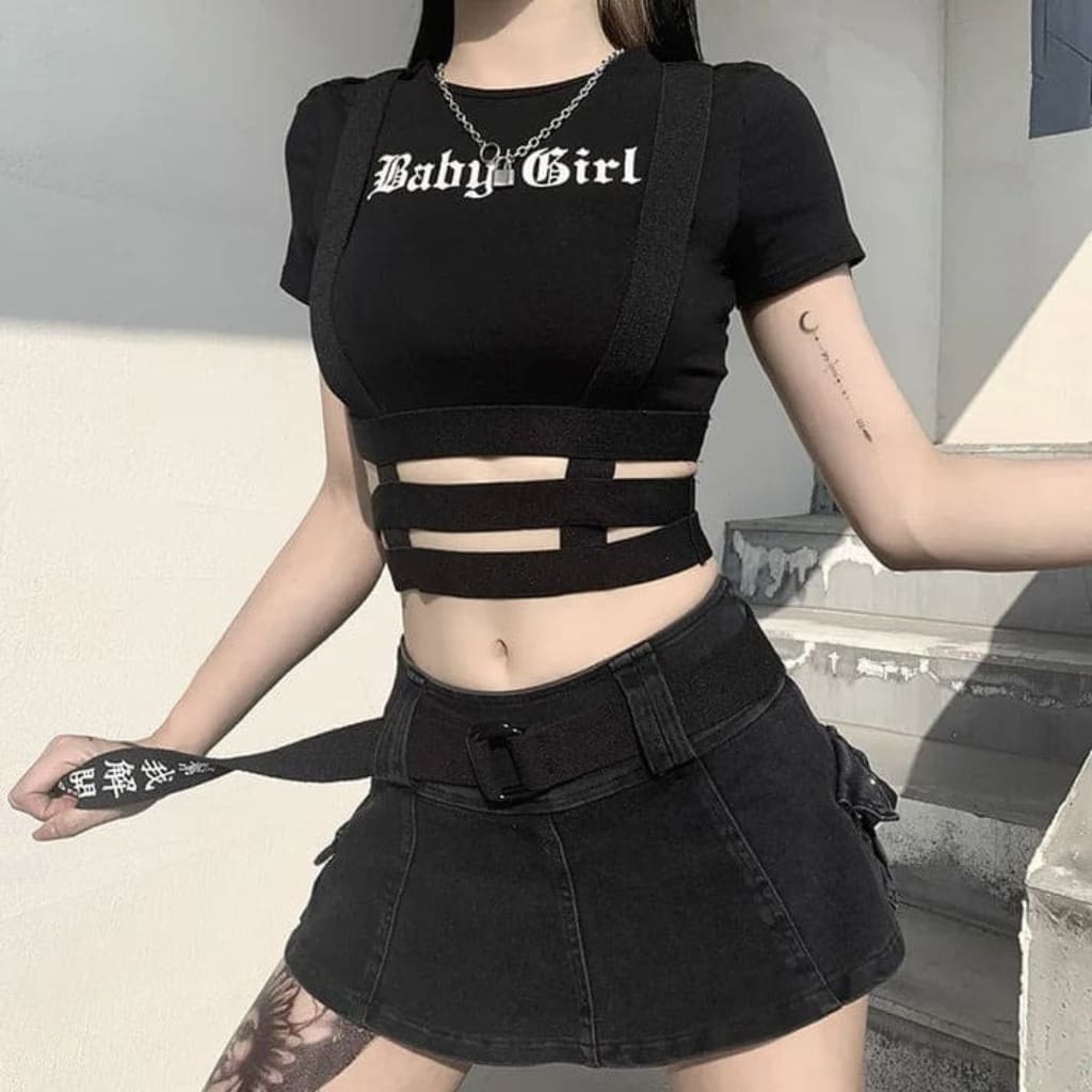 Edgy Baby Girl graphic crop top with bold text, cropped cut, and alt-goth style influence