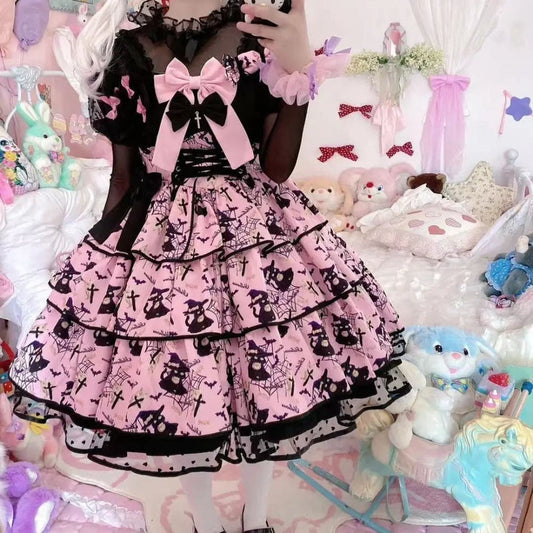 Haunted Babydoll Lolita Dress in pink with frilly ribbons and spooky kawaii vibes, perfect for DDLG fashion