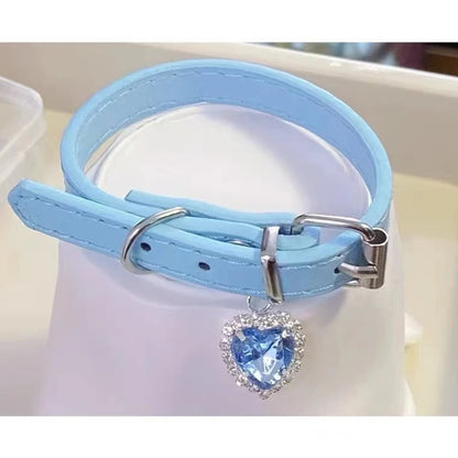 Blue vegan leather choker with sparkling heart pendant, cruelty-free and adjustable fit
