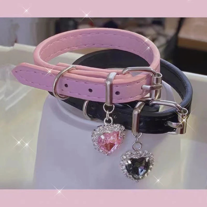 Vegan leather choker set with pink and black colors, adjustable fit and heart-shaped charm
