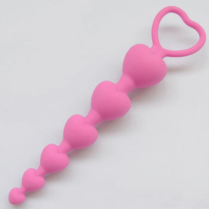 Heartbeat Skips Plug in pastel pink with 6 hearts from big to small, kawaii flirty ddlg soft girl accessory
