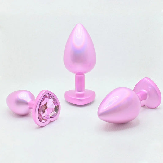 Holographic pink heart crystal plug with cute baddie DDLG aesthetic, playful and body-safe