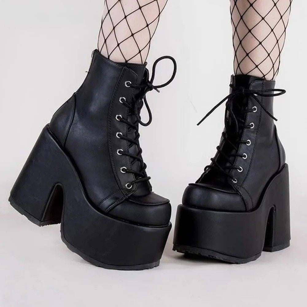 Black matte Iconic Energy platform boots with sleek finish for cyber-dollcore, DDLG, and trendy soft domme style