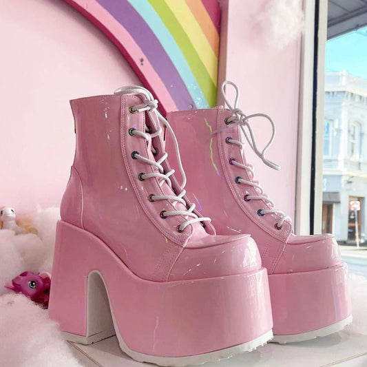 Black glossy Iconic Energy Platform Boots with chunky heel and thick platform, bold punk dollcore fashion footwear for stomping and high-energy style