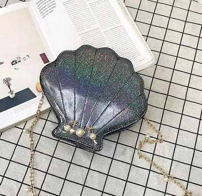 Black mermaid seashell bag with iridescent glow, kawaii DDLG ABDL aesthetic for pastel goth and oceancore brats 🐚🖤