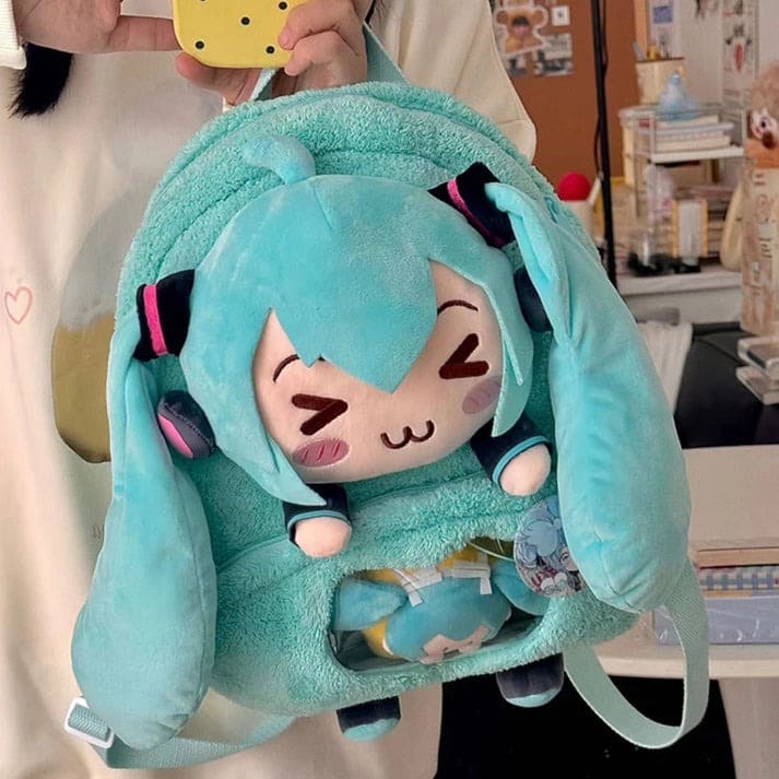 Anime-style plush backpack with iconic happy ":3" face, adjustable straps, and roomy interior for school or play.