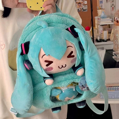 Anime-style plush backpack with iconic happy ":3" face, adjustable straps, and roomy interior for school or play.
