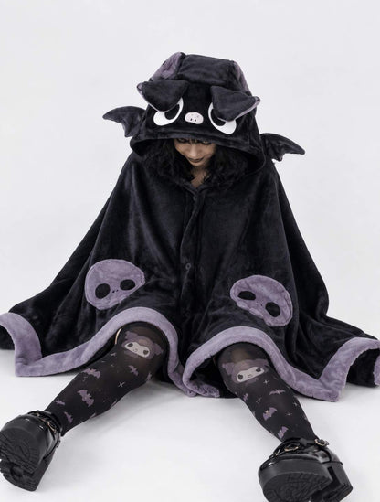 Model wearing Kawaii Baby Bat blanket cape while gaming, cozy DDLGirl style