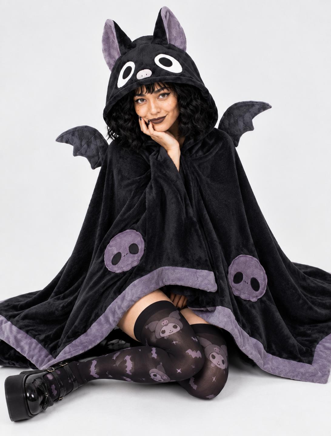 Model wearing Kawaii Baby Bat blanket cape showing mini wing detail