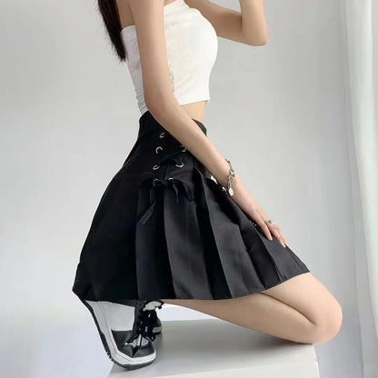 Kawaii black Dollcore pleated skirt with knife pleats and lace details for soft girl, cutecore, DDLG, and ABDL outfits