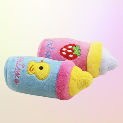 Strawberry and duckling variants of kawaii bottle plush squeaky toy together