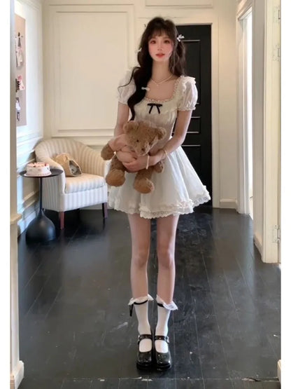Kawaii DDLG mini dress with white frills and black ribbon, cozy cute cutecore aesthetic