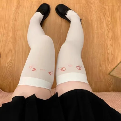 Adorable kawaii face print stockings perfect for cutecore and babycore outfits and comfy cosplay looks.