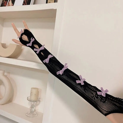 Full-arm lace bolero gloves in black and lilac, kawaii cutecore style with ribbon accents for cosplay, little space, and playful pastel outfits